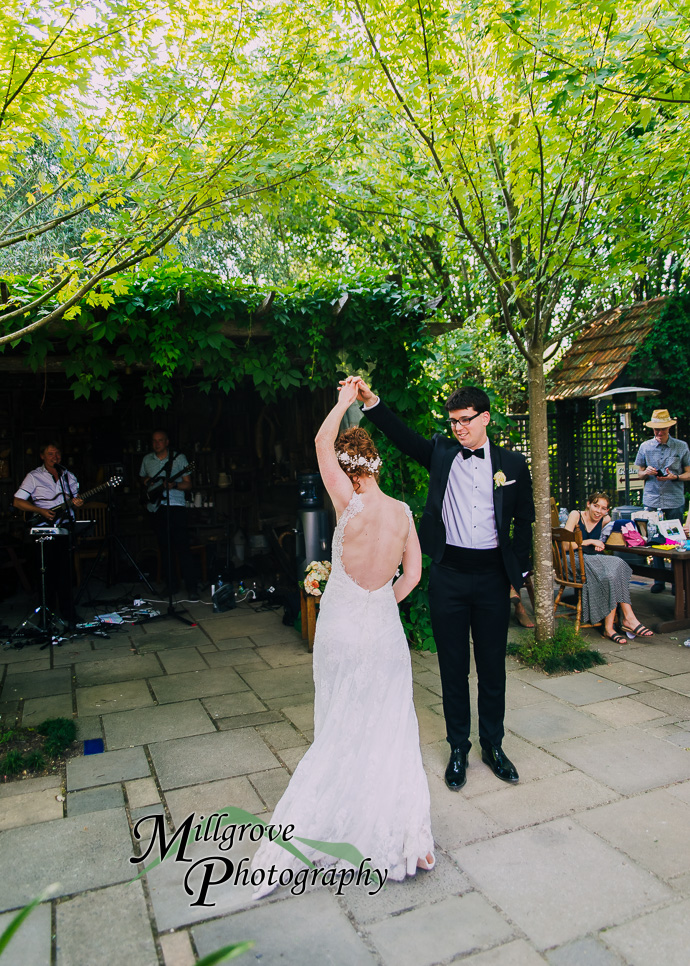 Guests celebrating with the bride and groom at their wedding