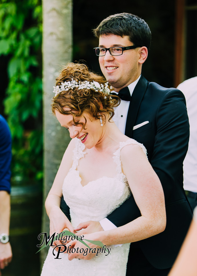 Guests celebrating with the bride and groom at their wedding