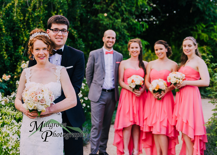 A bride and groom in a garden