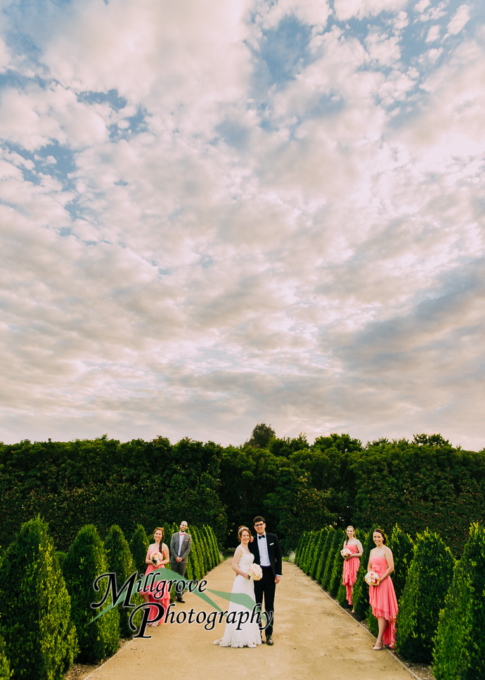 A bride and groom in a garden