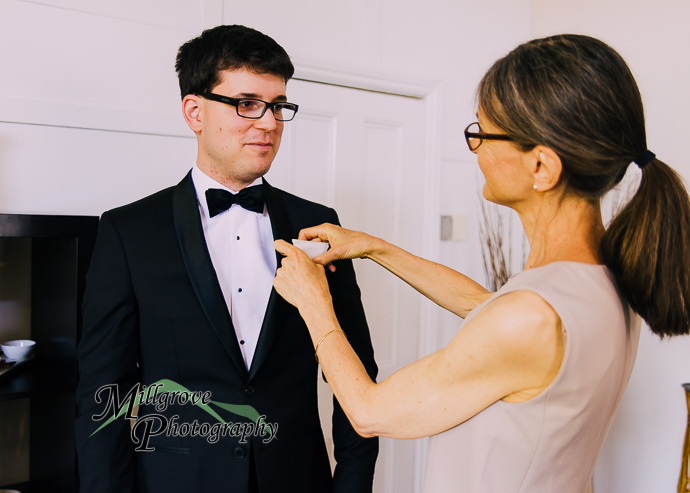 Groom and groomsmen getting ready for a wedding