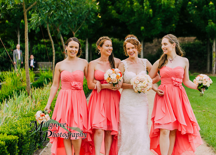 A bride and groom in a garden