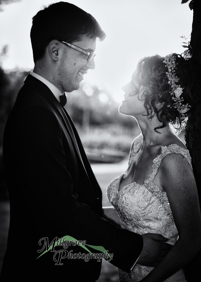 A bride and groom in a garden