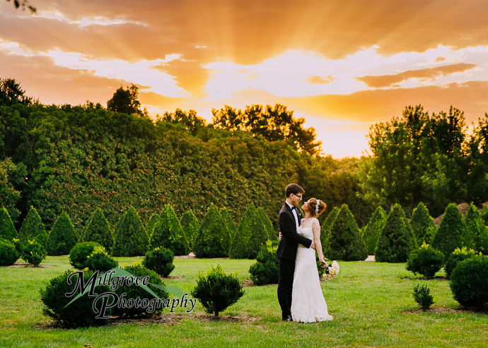 A bride and groom in a garden