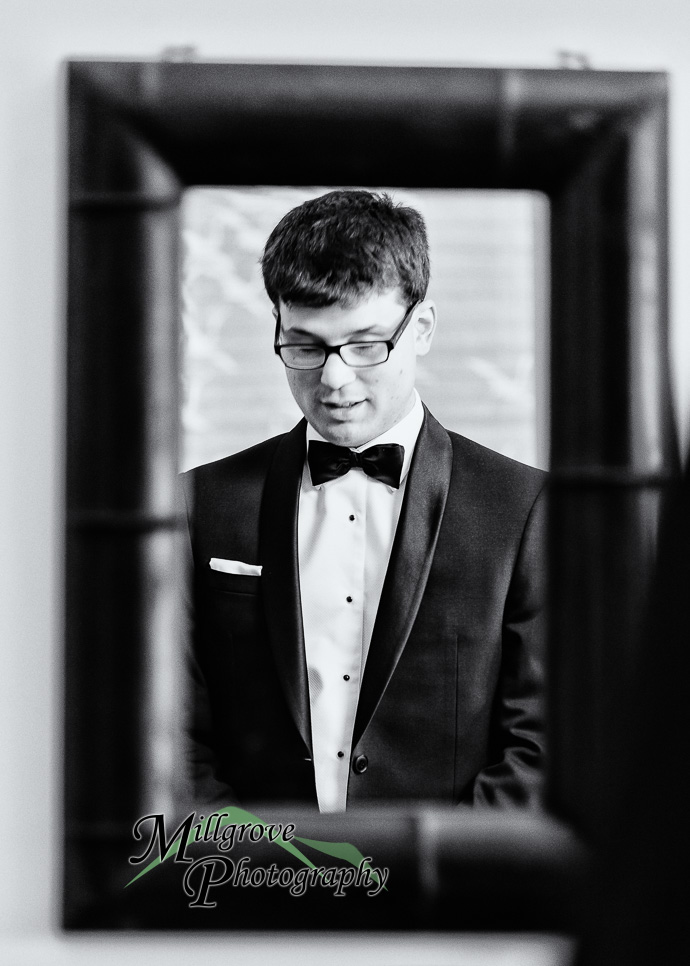 Groom and groomsmen getting ready for a wedding