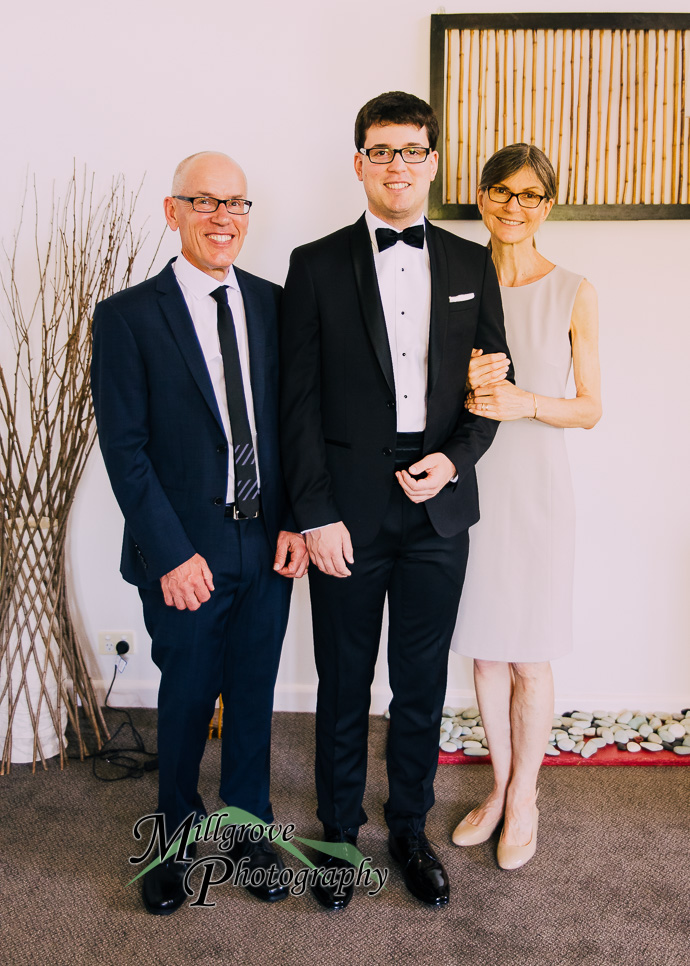 Groom and groomsmen getting ready for a wedding