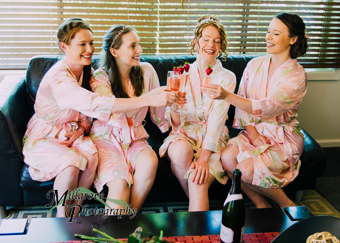 A bride and bridesmaids preparing for a wedding