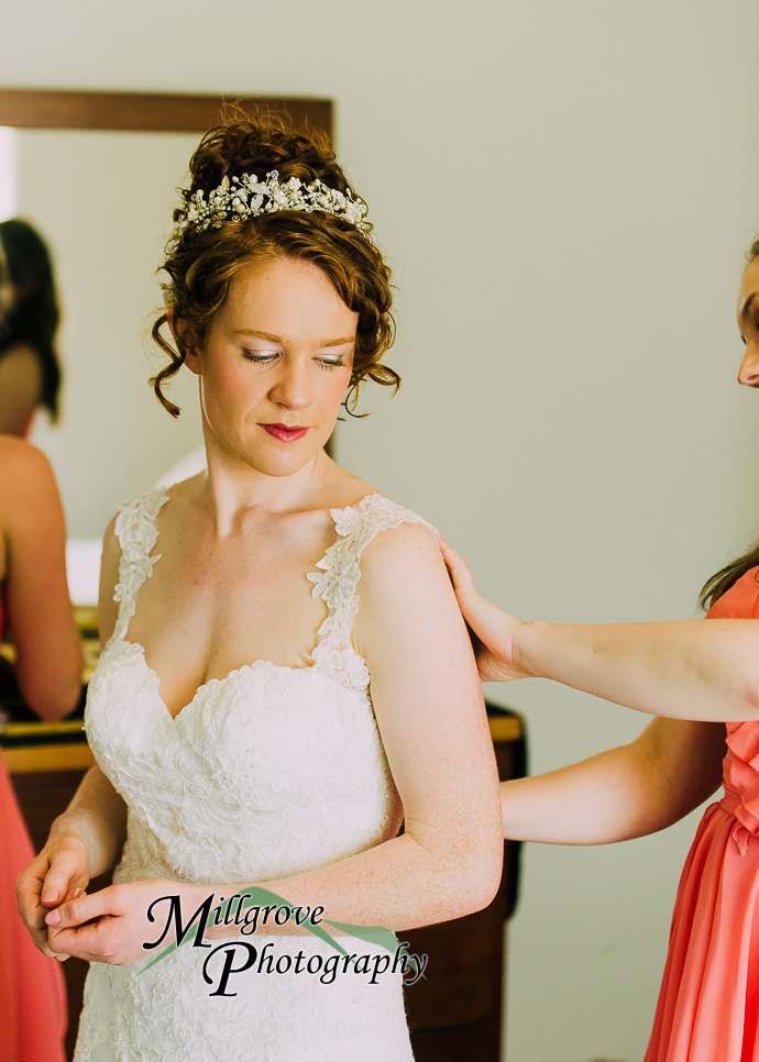 A bride and bridesmaids preparing for a wedding