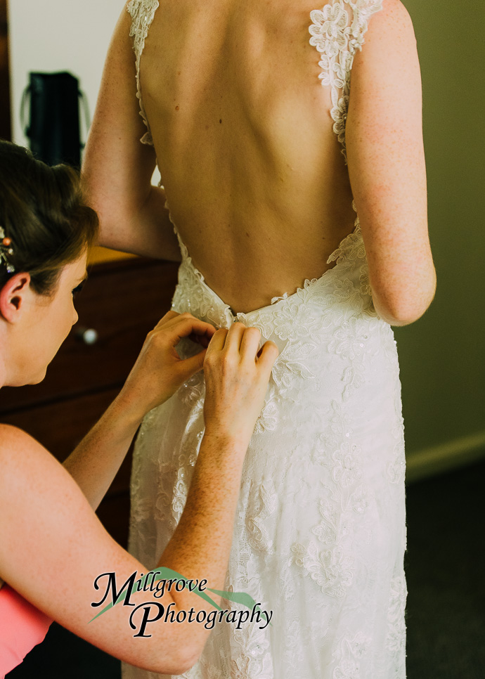 A bride and bridesmaids preparing for a wedding