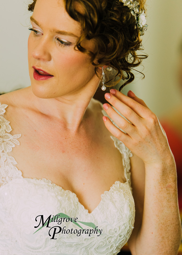 A bride and bridesmaids preparing for a wedding