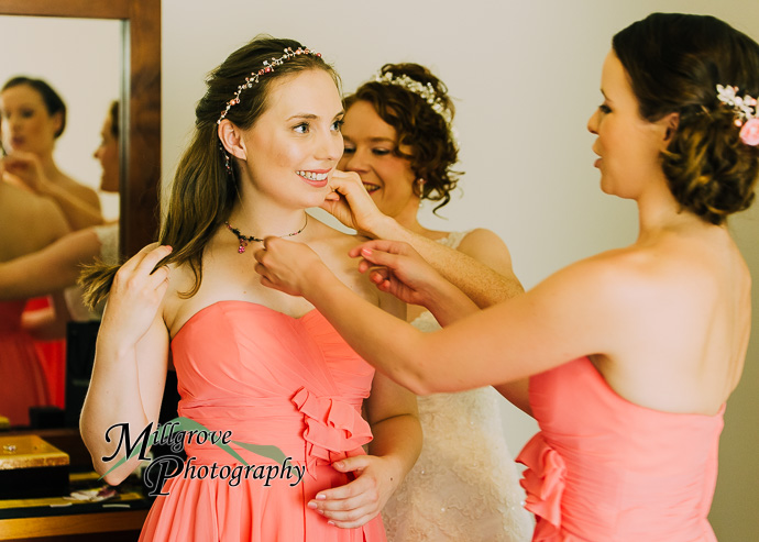 A bride and bridesmaids preparing for a wedding