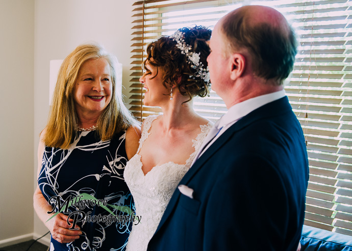 A bride and bridesmaids preparing for a wedding