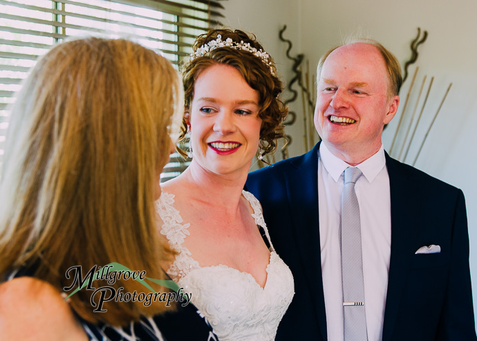 A bride and bridesmaids preparing for a wedding