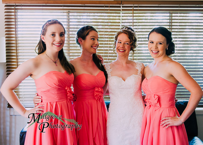 A bride and bridesmaids preparing for a wedding