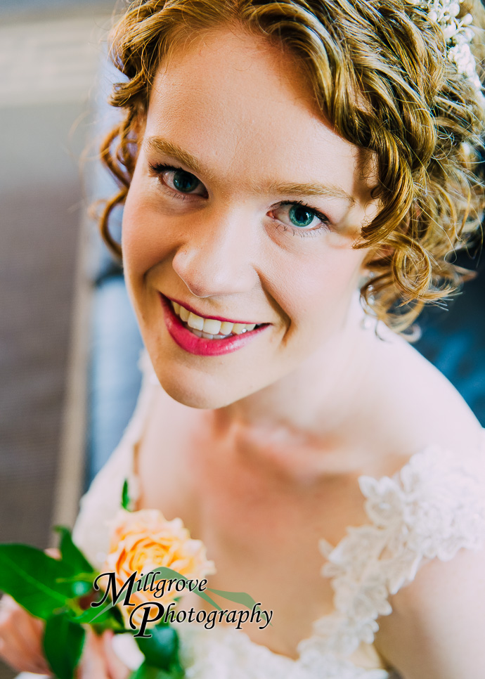 A bride and bridesmaids preparing for a wedding