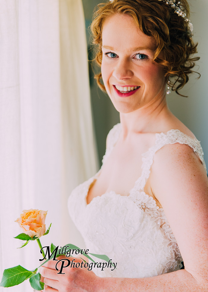 A bride and bridesmaids preparing for a wedding