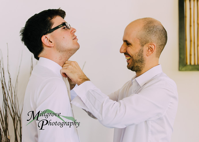 Groom and groomsmen getting ready for a wedding