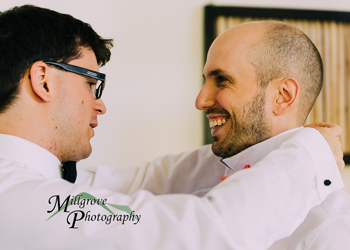 Groom and groomsmen getting ready for a wedding