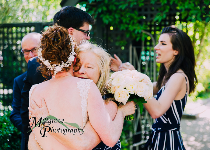 Portrait of a bride and groom at Alowyn Gardens