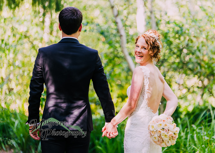 Portrait of a bride and groom at Alowyn Gardens