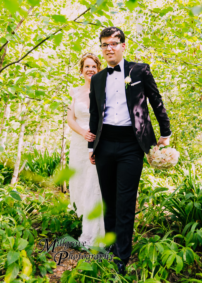 Portrait of a bride and groom at Alowyn Gardens