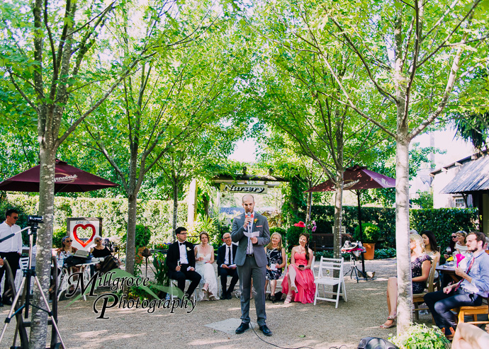 Guests giving speeches at a wedding