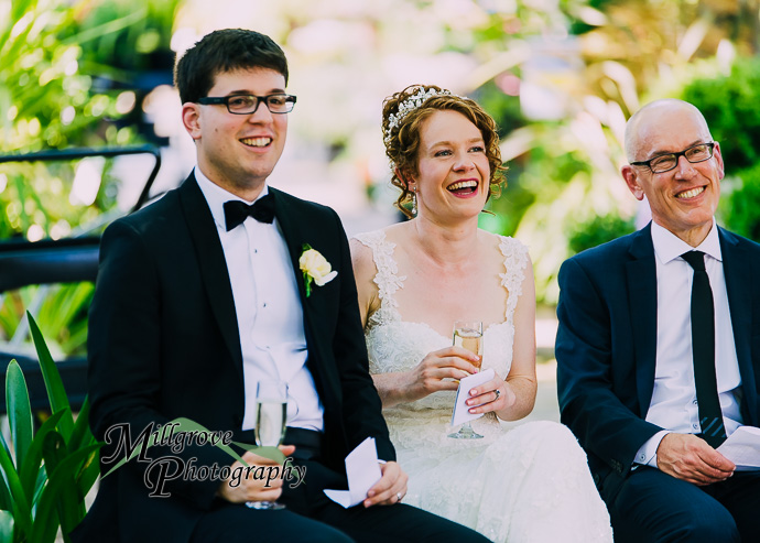 Guests giving speeches at a wedding