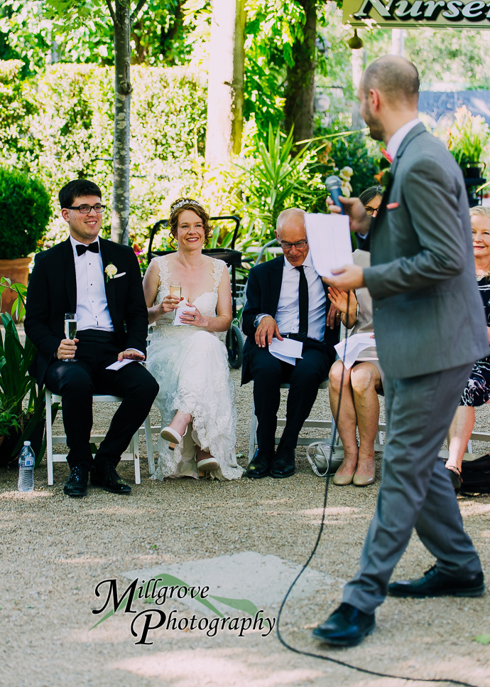 Guests giving speeches at a wedding