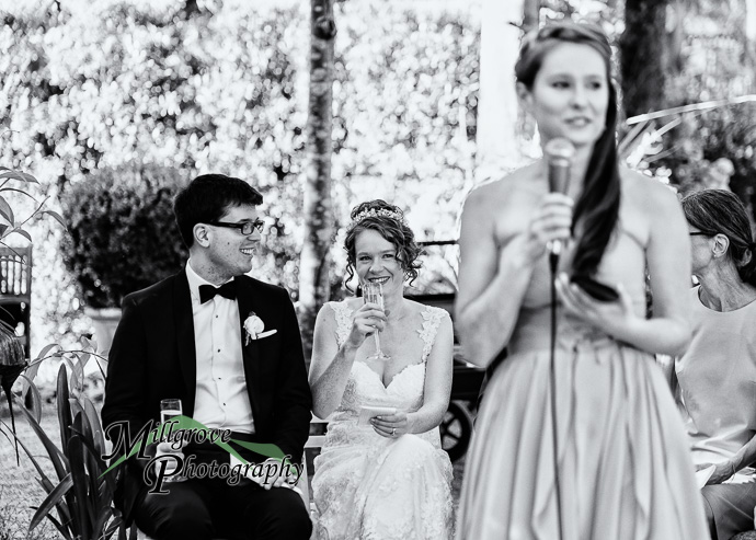 Guests giving speeches at a wedding