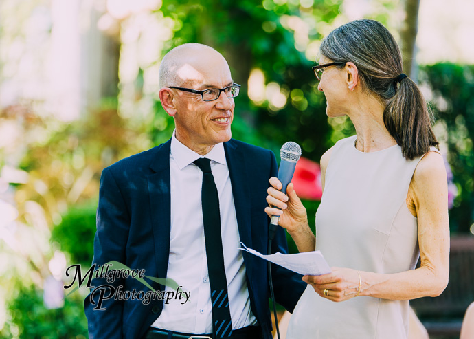 Guests giving speeches at a wedding