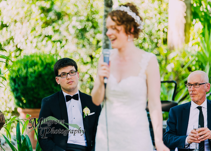 Guests giving speeches at a wedding