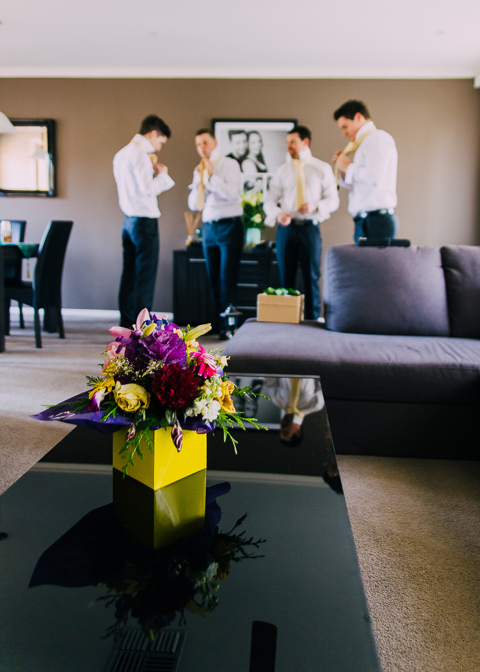 Flowers with men in background