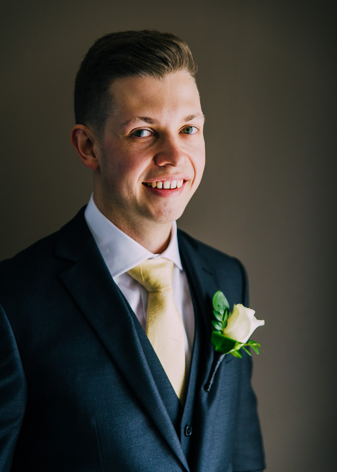 Groom looking at the camera