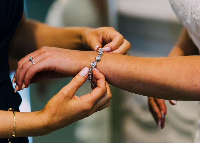 Woman's hand's adjusting bracelet