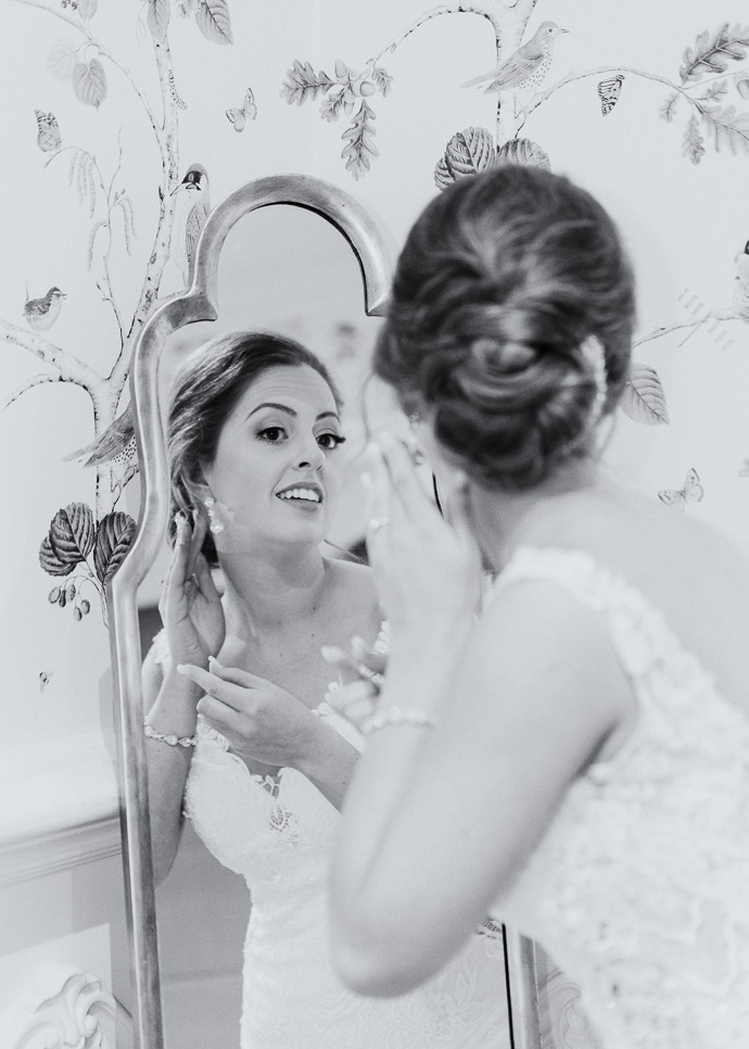 Bride looking in the mirror