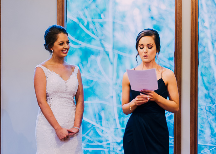 Two women reading a letter