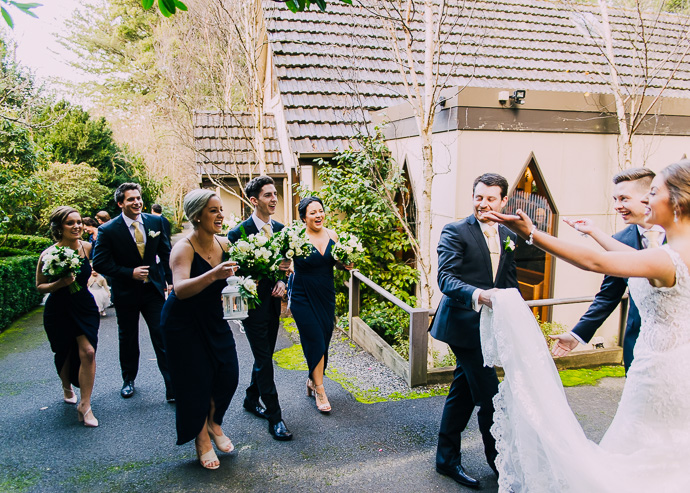 Bride and groom leaving chapel