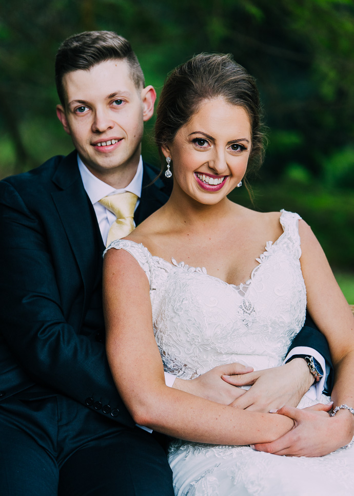 Bride and groom sitting