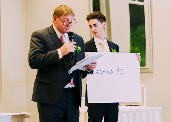 man reading a speech at a wedding