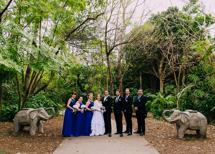 Melbourne Zoo Weddings - A bridal party standing in a garden