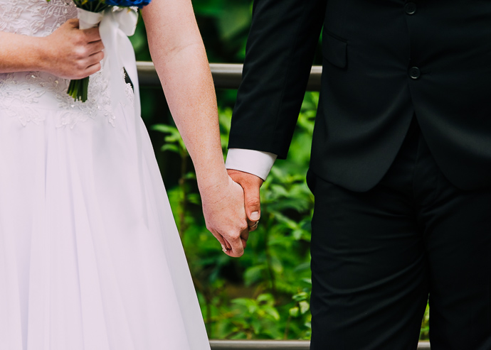 Two people holding hands