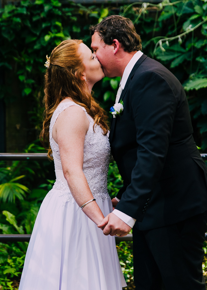 Bride and groom kissing
