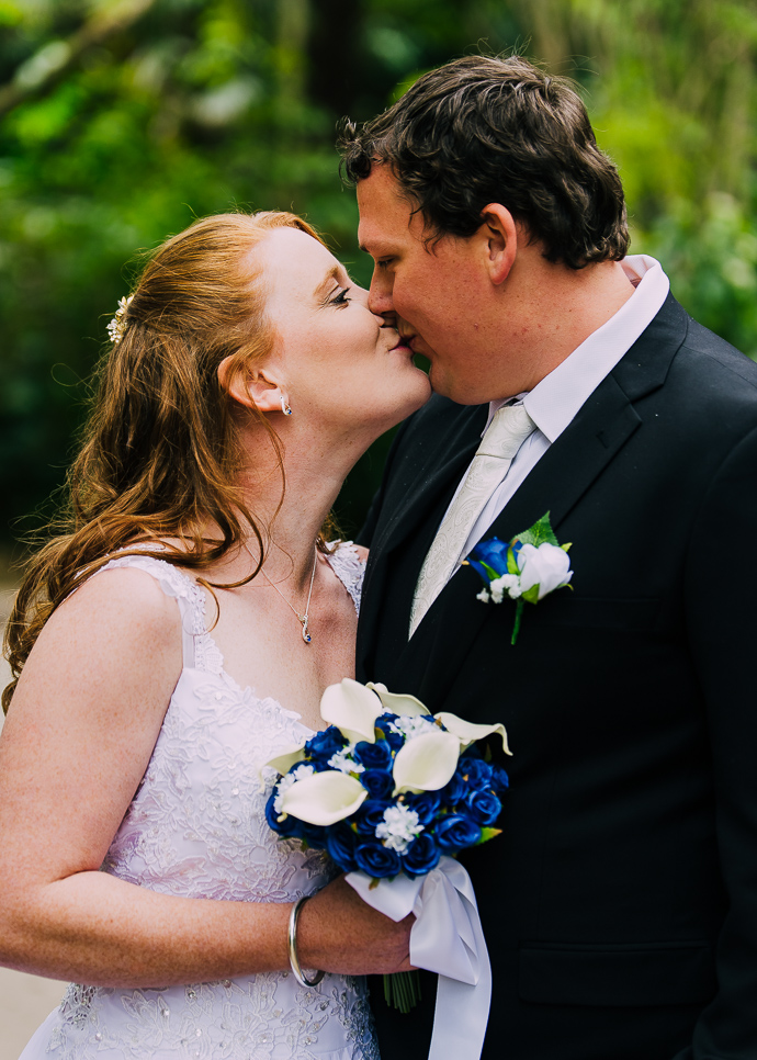 A bride and groom kissing