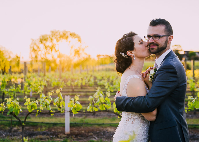 A bride and groom at a winery wedding at Witchmount Estate