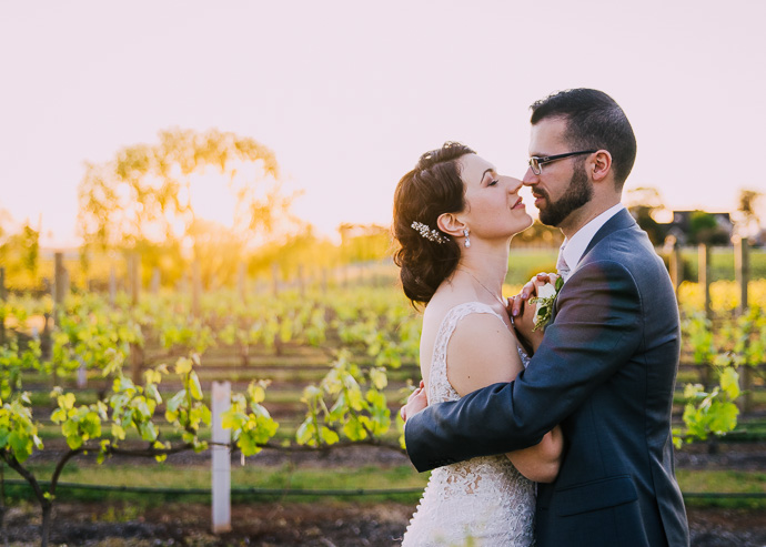 A bride and groom at a winery wedding at Witchmount Estate