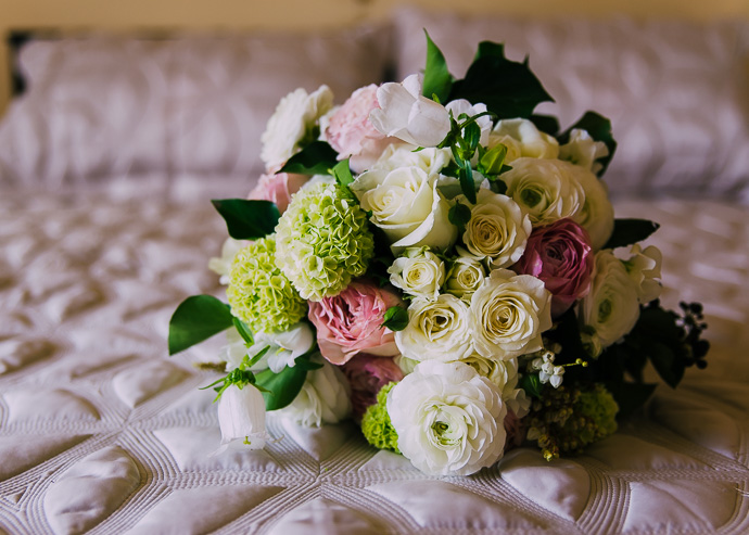 Flowers resting on a bed