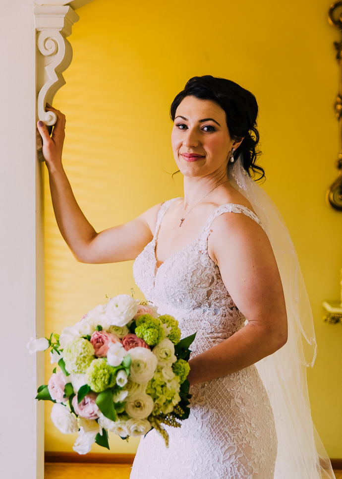 A bride standing in an archway