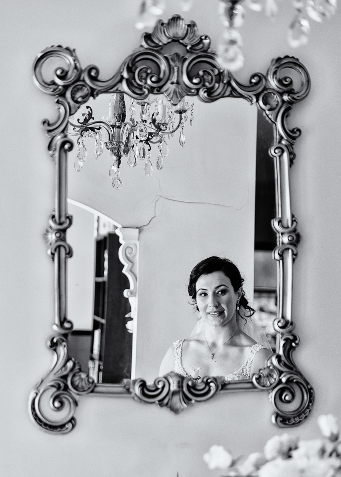 A bride photographed in the mirror