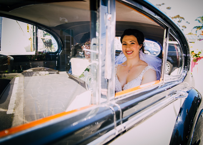 A bride seen through the car window