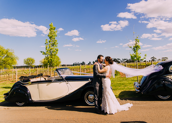 A bride and groom at a winery wedding